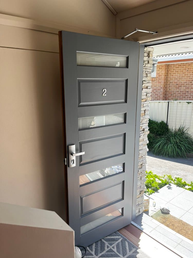 Repainted charcoal front entry door
